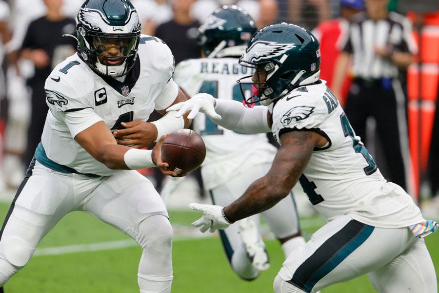 Kenneth Gainwell and Jalen Hurts of the Philadelphia Eagles